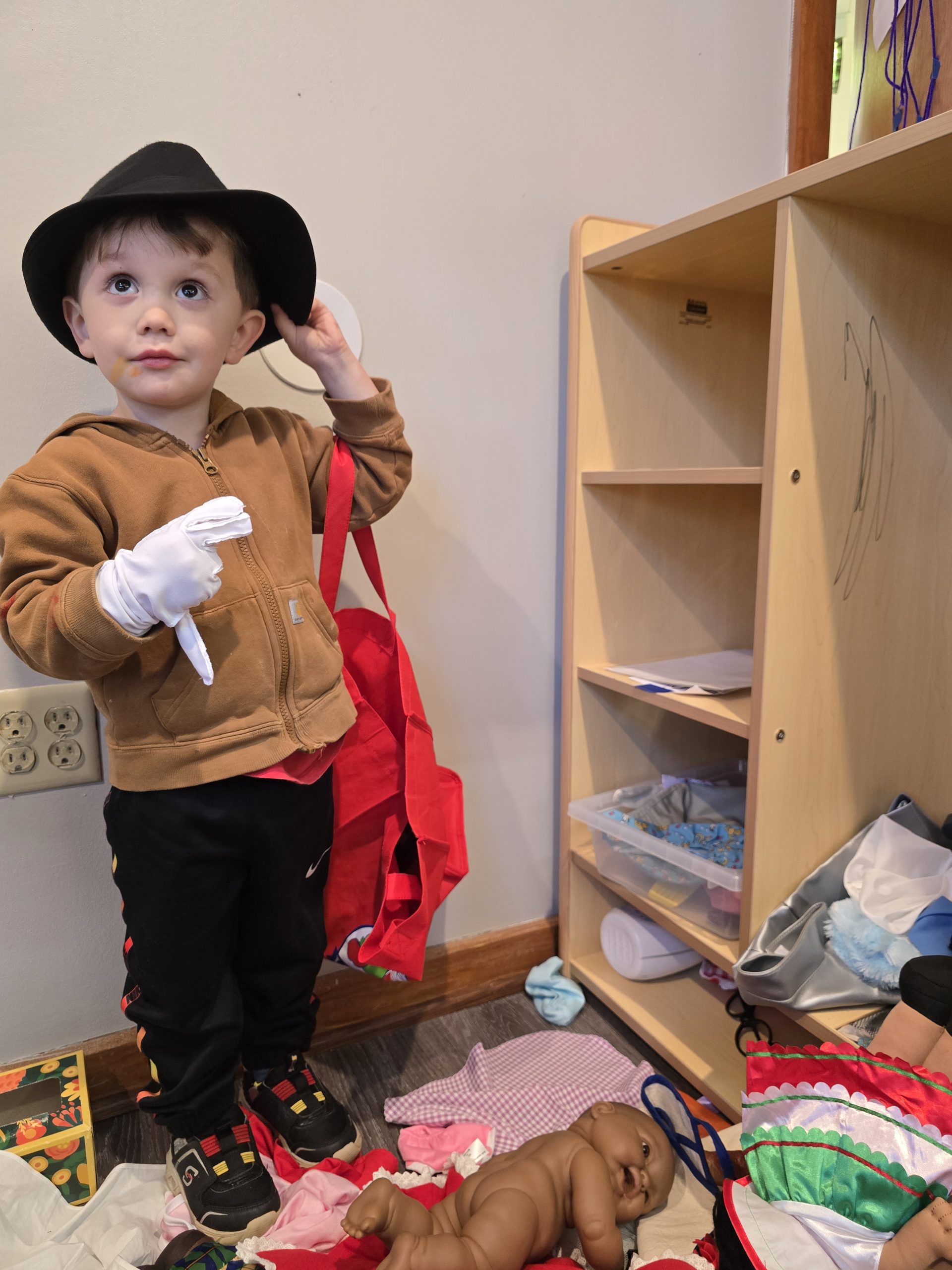 child at storage cubby