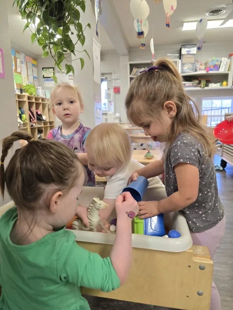 4 children playing inside daycare center in Landrum, SC